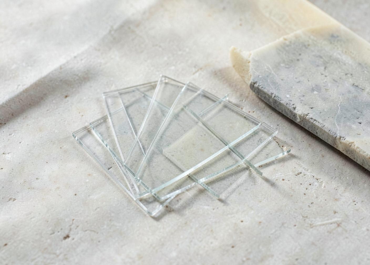 Restrained minimal diagnostic still life in cool ivory and stone tones