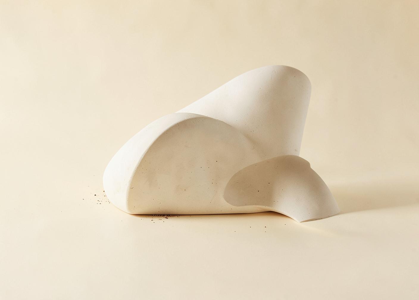 Elegant abstract composition of soft curved forms suggesting hormonal life stages in warm ivory and brown tones